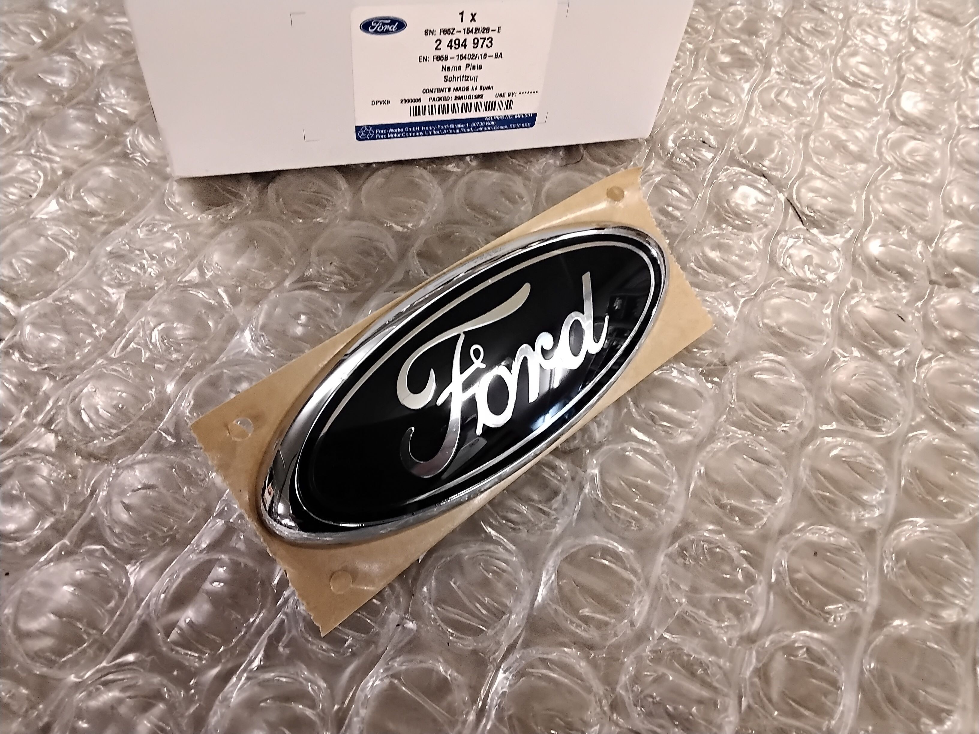 2494973-Ford Original Ford-Ornament hinten Ford Custom 2012-2014 - F85B-15402A16-BA